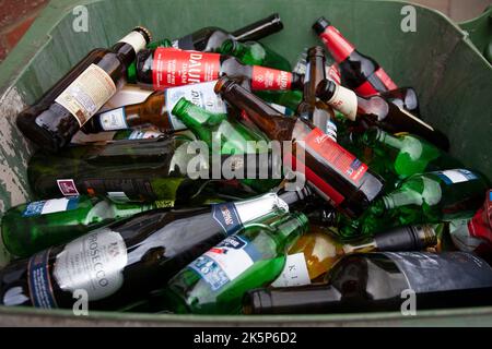 Glass bottles in recycle bin Stock Photo