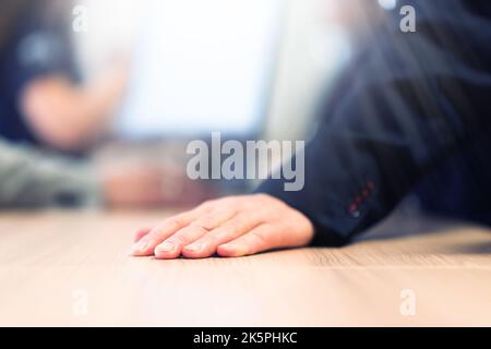 Conference Staff Member scan a QR code from attendee upon arrival to check-in site Stock Photo