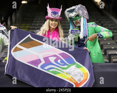 New Orleans, USA. 09th Oct, 2022. A pair of Seattle Seahawks fans pose for a photo during a National Football League Contest at the Caesars Superdome in New Orleans, Louisiana on Sunday, October 9, 2022. (Photo by Peter G. Forest/Sipa USA) Credit: Sipa USA/Alamy Live News Stock Photo