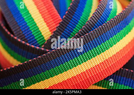 Close-up of rainbow curly ribbon, abstract background Stock Photo