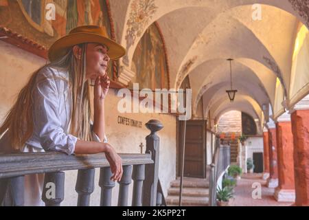 Young Tourists Exploring the Santa Catalina Monastery, Convento de Santa Catalina, Arequipa, Peru Stock Photo