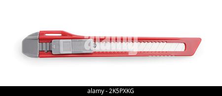 Red utility knife on white background Stock Photo