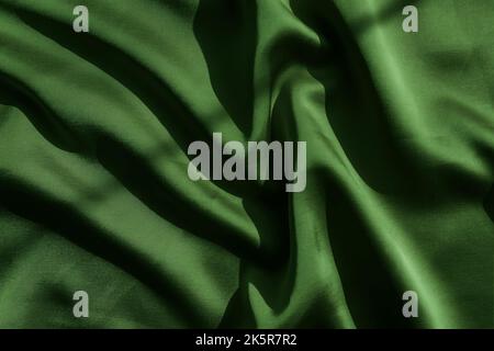 Green color fabric texture, silk or satin background Stock Photo