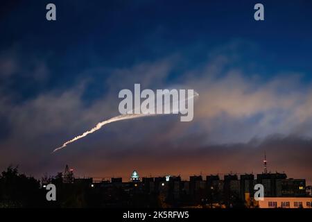 Soyuz space rocket launch. Space jellyfish in sky. Plume of rocket gases in sun at dawn. Jet trail from space rocket. Astronomical phenomenon over cit Stock Photo