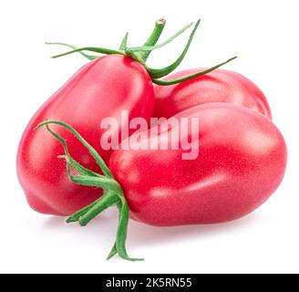 Three pink tomatoes (plums) isolated on white background. Stock Photo