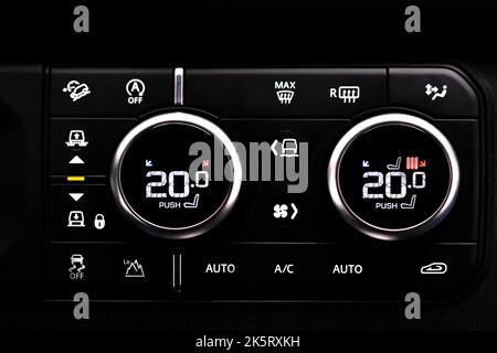 Selective focus of Vehicle Air Conditioning Control System. AC Recirculation Button on dashboard in luxury car. Selective  focusautomatic display air Stock Photo