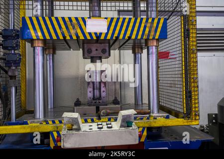 Automation hydraulic press stamping machine production line. Industrial metalworking machinery Stock Photo