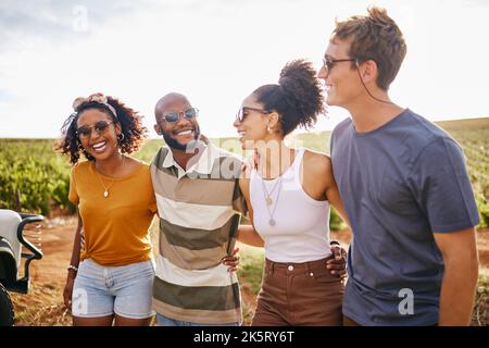 Summer, adventure and portrait of friends in nature on holiday, enjoying roadtrip. Vacation, freedom and young multicultural group smiling in Stock Photo