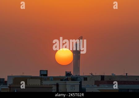 The Torch Tower in Doha Sport City Complex at sunset next to Aspire Zone Stock Photo