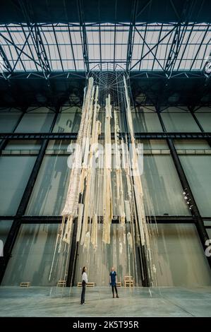 London, UK. 10th Oct, 2022. Hyundai Commission: Cecilia Vicuña, Brain Forest Quipu, in the Turbine Hall at Tate Modern. On show from 11 October 2022 to 16 April 2023. Credit: Guy Bell/Alamy Live News Stock Photo