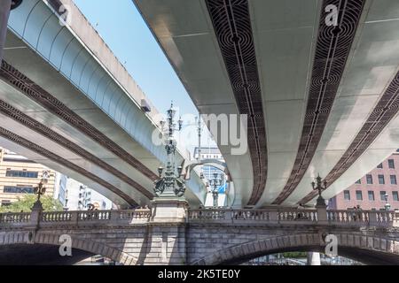 Elevated expressway roads and buildings,, viewed from below, from the Sumida river, Tokyo, Japan. Stock Photo