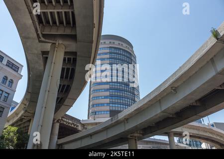 Elevated expressway roads and buildings,, viewed from below, from the Sumida river, Tokyo, Japan. Stock Photo