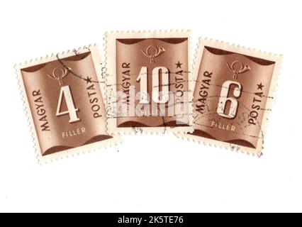 A montage of vintage postage stamps from Hungary on a white background. Stock Photo