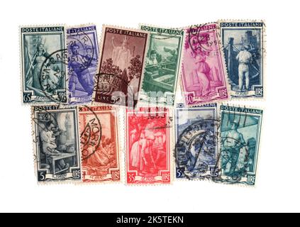 A montage of vintage postage stamps from Italy on a white background. Stock Photo