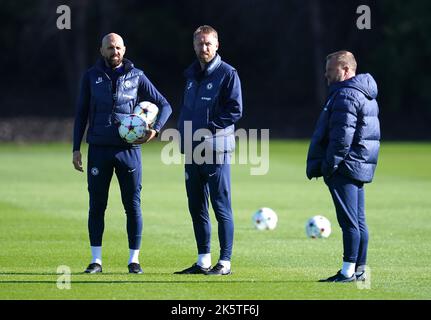 Chelsea manager Graham Potter (centre) with assistant coaches Salot Grau (left) and Billy Reid during a training session at The Cobham Training Centre, Stoke d'Abernon. Picture date: Monday October 10, 2022. Stock Photo