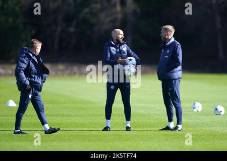 Chelsea manager Graham Potter (right) with assistant coaches Billy Reid (left) and Salot Grau during a training session at The Cobham Training Centre, Stoke d'Abernon. Picture date: Monday October 10, 2022. Stock Photo