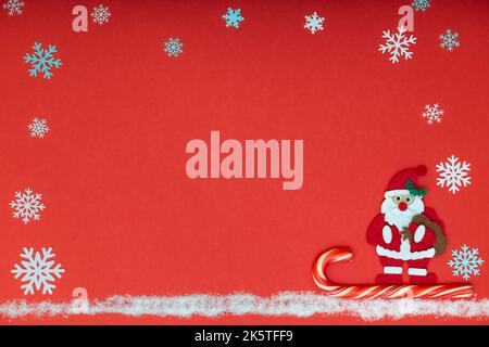 santa claus on a sleigh on a red background. High quality photo Stock Photo