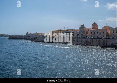 Syracuse, Italy - 09-16-2022: The seafront of Ortigia with its beautiful beach Stock Photo