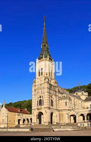 Main entrance of the basilica of Bois-Chenu (1881-1926) in Domrémy-la-Pucelle (Vosges), France Stock Photo