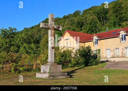 Jesus Christ on the cross outside the basilica of Bois-Chenu (1881-1926) in Domrémy-la-Pucelle (Vosges), France Stock Photo