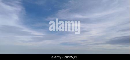 Beautiful blue sky with some clouds during summer on a nice day Stock Photo
