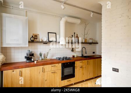 Stylish kitchen interior of modern apartment Stock Photo