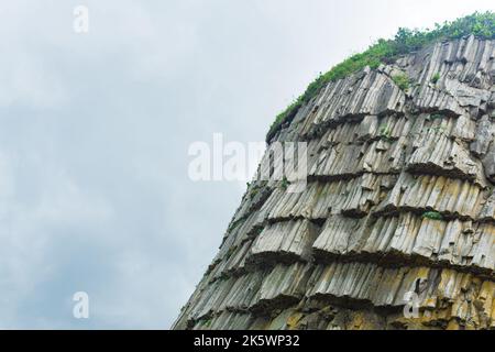 top of columnar volcanic basalt rocks on the island of Kunashir Stock Photo