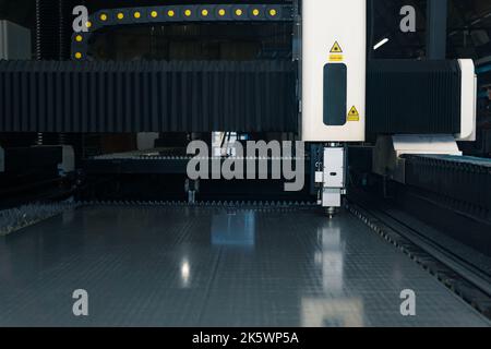 industrial laser cutting machine during metal sheet processing Stock Photo