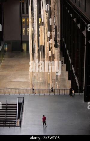 London, UK.  10 October 2022.  The unveiling of this year’s Hyundai Commission in the Turbine Hall at Tate Modern by Cecilia Vicuña.  The installation named ‘Brain Forest Quipu’ comprises two 27 metre tall quipu sculptures and continues the artist’s long-standing work with the ancient Andean tradition of the quipu and is on show 11 October 2022 to 16 April 2023.  Credit: Stephen Chung / Alamy Live News Stock Photo