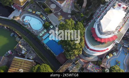 A high-angle shot of the Sengkaling waterpark with a ship in Malang city, East Java, Indonesia Stock Photo