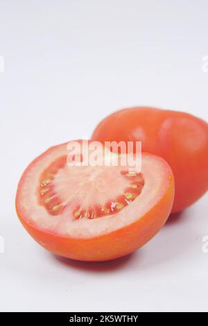 fresh tomato with water drop isolated on white  Stock Photo