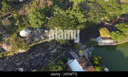 A high-angle shot of the Sengkaling waterpark trees in Malang city, East Java, Indonesia Stock Photo