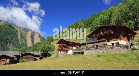 Traditional wooden swiss houses in the Alps mountain, Binn, Binntal, in the canton of Valais in Switzerland Stock Photo