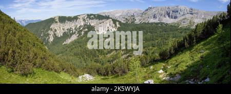 Panoramic view to the valley under Brennert and Mitterberg peaks with rocky peak Torstein in the background, Totes Gebirge, Alps, Austria Stock Photo