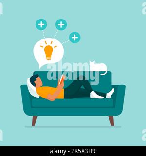 Creative man lying on the couch at home, he is reading and writing on a notebook Stock Vector