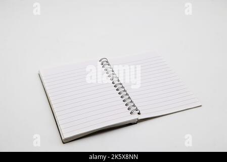 Open empty note book isolated on a white background. Stock Photo