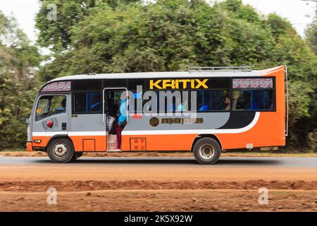 A bus driving along Ngong road near the junction with Oloolua Close. Ngong Road, Nairobi, Kenya.  4 Sep 2022 Stock Photo