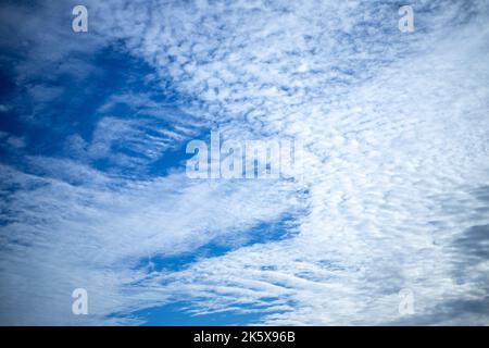 Blue sky background and white clouds soft focus. Stock Photo