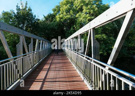 Footbridge across the old Lune river at the former Lune lock near Bremerhaven. Stock Photo