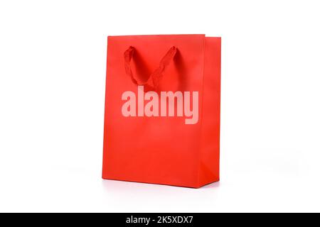 Red paper shopping gift bag on white background Stock Photo