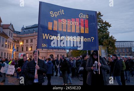 Schwerin, Germany. 10th Oct, 2022. Participants take off for a demonstration against the energy policy in the Northeast, a banner reads 'Gas Gas Electricity Pay From What?'. Credit: Bernd Wüstneck/dpa/Alamy Live News Stock Photo