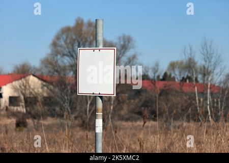 Empty sign on a land Stock Photo