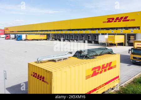 Fischamend: DHL Global Forwarding logistics center, trucks, container in Donau, Niederösterreich, Lower Austria, Austria Stock Photo