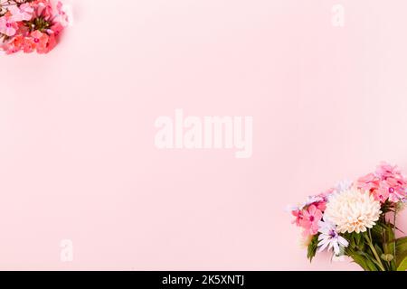 Autumn creative composition asters, hydrangea flowers on pink background. Fall, autumn background. Flat lay, top view, copy space. Stock Photo