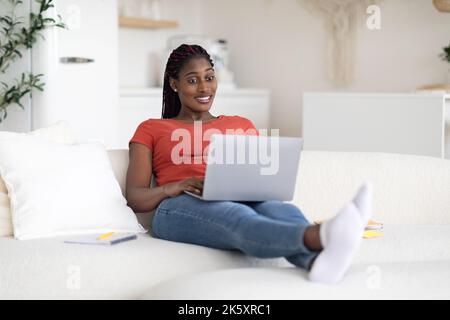 Online Education. Portrait Of Young Black Woman Studying With Laptop At Home Stock Photo