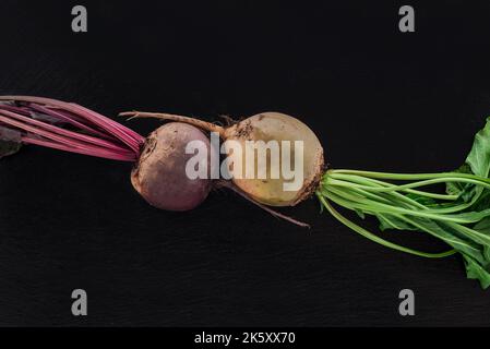 Beetroot on dark stone table. Top view. Vegetarian food concept. Stock Photo
