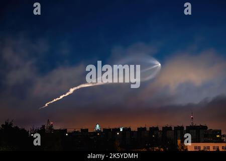 Soyuz space rocket launch. Space jellyfish in sky. Plume of rocket gases in sun at dawn. Jet trail from space rocket. Astronomical phenomenon over cit Stock Photo