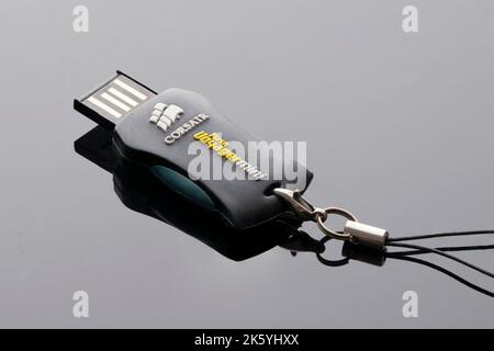 usb flash drive for computer folding on a black background close-up Stock Photo