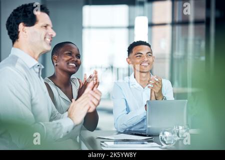 Applause, celebration and business people in meeting for success, company goal or teamwork achievement with diversity staff. Office corporate worker Stock Photo