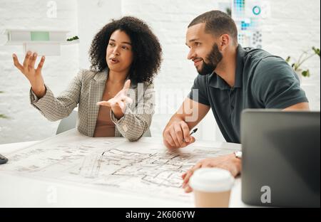architect coworkers planning a building together. Businesspeople working on an architectural project together. Team of engineers collaborate on a 3D Stock Photo